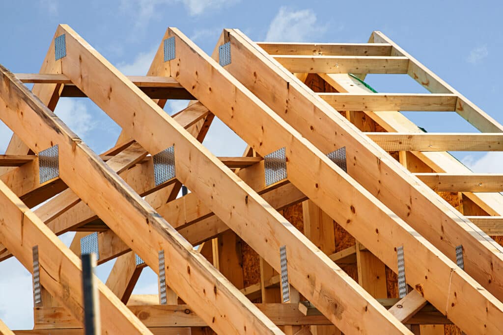 Standard timber framed building with close up on the roof trusses